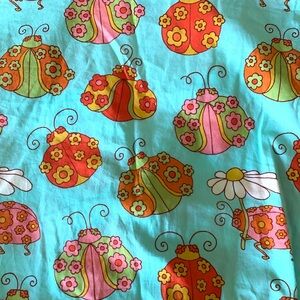 ModCloth x Marisol Muro fabulous fantasies colorful ladybug and daisies wrap top